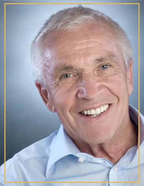 Smiling senior man with natural-looking dentures