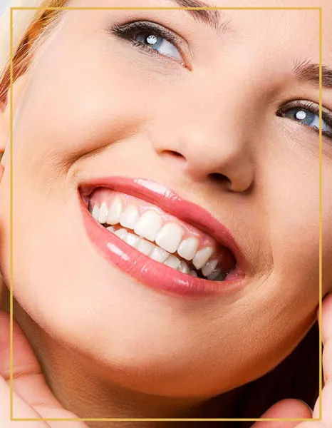 Woman with a natural, healthy smile after tooth-coloured fillings